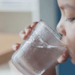 Drinking Water / Young Child with Glass of Water